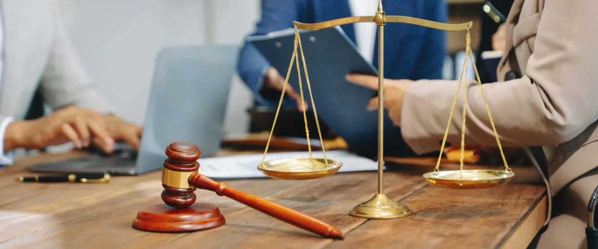 business-people-and-lawyers-discussing-contract-min